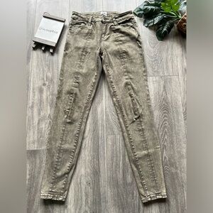 Wash lab cotton poly stretch skinny jeans in a rustic olive color. Size 25